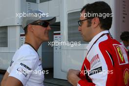 24.06.2010 Valencia, Spain,  Michael Schumacher (GER), Mercedes GP Petronas and Stefano Domenicali (ITA) Ferrari General Director - Formula 1 World Championship, Rd 9, European Grand Prix, Thursday