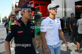 24.06.2010 Valencia, Spain,  Sebastian Vettel (GER), Red Bull Racing and Michael Schumacher (GER), Mercedes GP Petronas - Formula 1 World Championship, Rd 9, European Grand Prix, Thursday