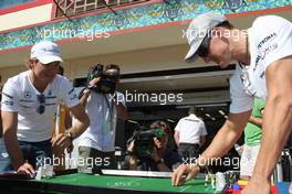 24.06.2010 Valencia, Spain,  Nico Rosberg (GER), Mercedes GP Petronas and Michael Schumacher (GER), Mercedes GP Petronas play table football - Formula 1 World Championship, Rd 9, European Grand Prix, Thursday