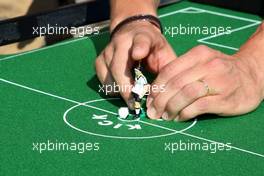 24.06.2010 Valencia, Spain,  Michael Schumacher (GER), Mercedes GP Petronas play table football - Formula 1 World Championship, Rd 9, European Grand Prix, Thursday