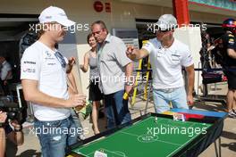 24.06.2010 Valencia, Spain,  Nico Rosberg (GER), Mercedes GP Petronas and Michael Schumacher (GER), Mercedes GP Petronas play table football - Formula 1 World Championship, Rd 9, European Grand Prix, Thursday