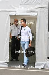 09.07.2010 Silverstone, England,  Karl-Heinz Zimmerman (AUT) and Michael Schumacher (GER), Mercedes GP Petronas - Formula 1 World Championship, Rd 10, British Grand Prix, Friday