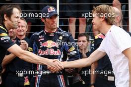 11.07.2010 Silverstone, England,  Red Bull team celebrate Mark Webbers win, Mark Webber (AUS), Red Bull Racing, Sebastian Vettel (GER), Red Bull Racing - Formula 1 World Championship, Rd 10, British Grand Prix, Sunday Podium