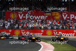 11.07.2010 Silverstone, England,  Mark Webber (AUS), Red Bull Racing and Sebastian Vettel (GER), Red Bull Racing at the start of the race - Formula 1 World Championship, Rd 10, British Grand Prix, Sunday Race