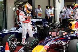 10.07.2010 Silverstone, England,  Lewis Hamilton (GBR), McLaren Mercedes takes a look at the Red Bull - Formula 1 World Championship, Rd 10, British Grand Prix, Saturday Qualifying