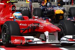 10.07.2010 Silverstone, England,  Fernando Alonso (ESP), Scuderia Ferrari and Sebastian Vettel (GER), Red Bull Racing  - Formula 1 World Championship, Rd 10, British Grand Prix, Saturday Practice