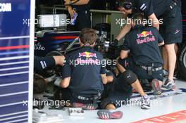 10.07.2010 Silverstone, England,  Sebastian Vettel (GER), Red Bull Racing having work done to his brakes - Formula 1 World Championship, Rd 10, British Grand Prix, Saturday Practice