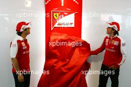 08.07.2010 Silverstone, England,  Felipe Massa (BRA), Scuderia Ferrari and Fernando Alonso (ESP), Scuderia Ferrari present the new Scuderia Ferrari logo - Formula 1 World Championship, Rd 10, British Grand Prix, Thursday