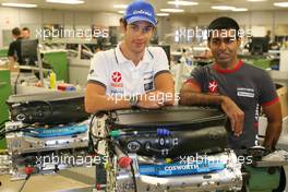 08.07.2010 Silverstone, England,  Bruno Senna (BRA), Hispania Racing F1 Team HRT and Karun Chandhok (IND), Hispania Racing F1 Team HRT, visit of the Cosworth factory in Northhampton - Formula 1 World Championship, Rd 10, British Grand Prix, Thursday