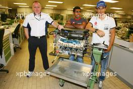 08.07.2010 Silverstone, England,  Mark Gallagher (IRL), General Manager of Cosworth's F1 Business Unit , Karun Chandhok (IND), Hispania Racing F1 Team HRT and Bruno Senna (BRA), Hispania Racing F1 Team HRT, visit of the Cosworth factory in Northhampton - Formula 1 World Championship, Rd 10, British Grand Prix, Thursday