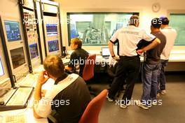 08.07.2010 Silverstone, England,  Mark Gallagher (IRL), General Manager of Cosworth's F1 Business Unit , Bruno Senna (BRA), Hispania Racing F1 Team HRT and Karun Chandhok (IND), Hispania Racing F1 Team HRT, visit of the Cosworth factory in Northhampton - Formula 1 World Championship, Rd 10, British Grand Prix, Thursday