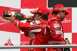 25.07.2010 Hockenheim, Germany,  Fernando Alonso (ESP), Scuderia Ferrari, Felipe Massa (BrA), Scuderia Ferrari - Formula 1 World Championship, Rd 11, German Grand Prix, Sunday Podium