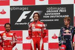 25.07.2010 Hockenheim, Germany,  Felipe Massa (BRA), Scuderia Ferrari leads Fernando Alonso (ESP), Scuderia Ferrari and Sebastian Vettel (GER), Red Bull Racing at the start - Formula 1 World Championship, Rd 11, German Grand Prix, Sunday Podium