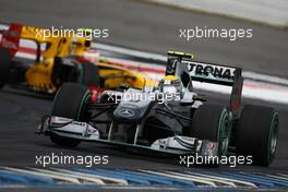 25.07.2010 Hockenheim, Germany,  Nico Rosberg (GER), Mercedes GP Petronas leads Vitaly Petrov (RUS), Renault F1 Team - Formula 1 World Championship, Rd 11, German Grand Prix, Sunday Race
