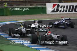25.07.2010 Hockenheim, Germany,  Michael Schumacher (GER), Mercedes GP Petronas leads Nico Rosberg (GER), Mercedes GP Petronas - Formula 1 World Championship, Rd 11, German Grand Prix, Sunday Race