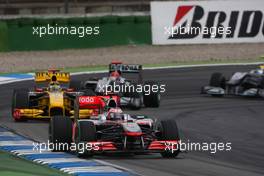 25.07.2010 Hockenheim, Germany,  Jenson Button (GBR), McLaren Mercedes leads Robert Kubica (POL), Renault F1 Team - Formula 1 World Championship, Rd 11, German Grand Prix, Sunday Race