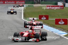 25.07.2010 Hockenheim, Germany,  Felipe Massa (BRA), Scuderia Ferrari, F10 leads Fernando Alonso (ESP), Scuderia Ferrari, F10 - Formula 1 World Championship, Rd 11, German Grand Prix, Sunday Race
