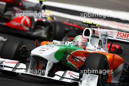 25.07.2010 Hockenheim, Germany,  Vitantonio Liuzzi (ITA), Force India F1 Team leads Lewis Hamilton (GBR), McLaren Mercedes - Formula 1 World Championship, Rd 11, German Grand Prix, Sunday Race