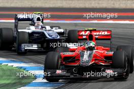 25.07.2010 Hockenheim, Germany,  Lucas di Grassi (BRA), Virgin Racing VR-01 leads Nico Hulkenberg (GER), Williams F1 Team - Formula 1 World Championship, Rd 11, German Grand Prix, Sunday Race