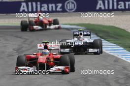 25.07.2010 Hockenheim, Germany,  Fernando Alonso (ESP), Scuderia Ferrari leads Felipe Massa (BRA), Scuderia Ferrari - Formula 1 World Championship, Rd 11, German Grand Prix, Sunday Race