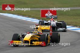 25.07.2010 Hockenheim, Germany,  Robert Kubica (POL), Renault F1 Team, R30 leads Michael Schumacher (GER), Mercedes GP Petronas, W01 - Formula 1 World Championship, Rd 11, German Grand Prix, Sunday Race