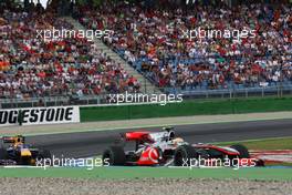 25.07.2010 Hockenheim, Germany,  Lewis Hamilton (GBR), McLaren Mercedes leads Mark Webber (AUS), Red Bull Racing - Formula 1 World Championship, Rd 11, German Grand Prix, Sunday Race