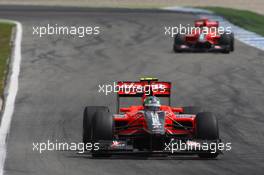 25.07.2010 Hockenheim, Germany,  Lucas di Grassi (BRA), Virgin Racing leads Timo Glock (GER), Virgin Racing - Formula 1 World Championship, Rd 11, German Grand Prix, Sunday Race