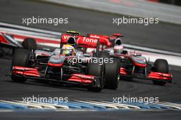 25.07.2010 Hockenheim, Germany,  Lewis Hamilton (GBR), McLaren Mercedes leads Jenson Button (GBR), McLaren Mercedes - Formula 1 World Championship, Rd 11, German Grand Prix, Sunday Race