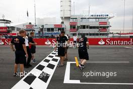 22.07.2010 Mannheim, Germany,  Sebastian Vettel (GER), Red Bull Racing walks the track and looks at the front of the grid  - Formula 1 World Championship, Rd 11, German Grand Prix, Thursday
