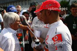 30.07.2010 Budapest, Hungary,  Bernie Ecclestone (GBR) and Lewis Hamilton (GBR), McLaren Mercedes - Formula 1 World Championship, Rd 12, Hungarian Grand Prix, Friday