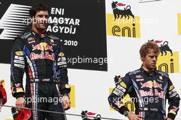 01.08.2010 Budapest, Hungary,  Mark Webber (AUS), Red Bull Racing first, Sebastian Vettel (GER), Red Bull Racing third - Formula 1 World Championship, Rd 12, Hungarian Grand Prix, Sunday Podium