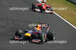01.08.2010 Budapest, Hungary,  Mark Webber (AUS), Red Bull Racing leads Felipe Massa (BRA), Scuderia Ferrari - Formula 1 World Championship, Rd 12, Hungarian Grand Prix, Sunday Race
