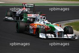 01.08.2010 Budapest, Hungary,  Andy Soucek (ESP) leads Michael Schumacher (GER), Mercedes GP Petronas - Formula 1 World Championship, Rd 12, Hungarian Grand Prix, Sunday Race