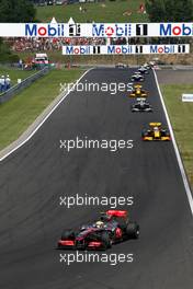 01.08.2010 Budapest, Hungary,  Lewis Hamilton (GBR), McLaren Mercedes, MP4-25 leads Vitaly Petrov (RUS), Renault F1 Team, R30 - Formula 1 World Championship, Rd 12, Hungarian Grand Prix, Sunday Race