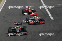 01.08.2010 Budapest, Hungary,  Sakon Yamamoto (JPN), Hispania Racing F1 Team HRT leads Lewis Hamilton (GBR), McLaren Mercedes - Formula 1 World Championship, Rd 12, Hungarian Grand Prix, Sunday Race