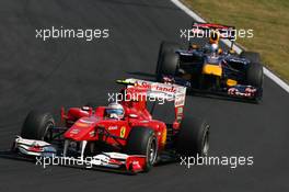 01.08.2010 Budapest, Hungary,  Fernando Alonso (ESP), Scuderia Ferrari leads Sebastian Vettel (GER), Red Bull Racing - Formula 1 World Championship, Rd 12, Hungarian Grand Prix, Sunday Race
