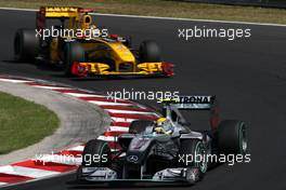01.08.2010 Budapest, Hungary,  Nico Rosberg (GER), Mercedes GP Petronas, W01 leads Robert Kubica (POL), Renault F1 Team, R30 - Formula 1 World Championship, Rd 12, Hungarian Grand Prix, Sunday Race