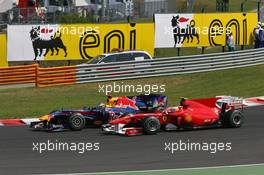 01.08.2010 Budapest, Hungary,  Sebastian Vettel (GER), Red Bull Racing and Fernando Alonso (ESP), Scuderia Ferrari at the start of the race - Formula 1 World Championship, Rd 12, Hungarian Grand Prix, Sunday Race