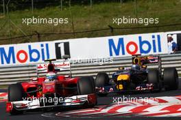 01.08.2010 Budapest, Hungary,  Fernando Alonso (ESP), Scuderia Ferrari leads Sebastian Vettel (GER), Red Bull Racing - Formula 1 World Championship, Rd 12, Hungarian Grand Prix, Sunday Race