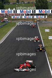 01.08.2010 Budapest, Hungary,  Fernando Alonso (ESP), Scuderia Ferrari, F10 leads Mark Webber (AUS), Red Bull Racing, RB6 - Formula 1 World Championship, Rd 12, Hungarian Grand Prix, Sunday Race