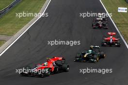01.08.2010 Budapest, Hungary,  Lucas di Grassi (BRA), Virgin Racing leads Heikki Kovalainen (FIN), Lotus F1 Team - Formula 1 World Championship, Rd 12, Hungarian Grand Prix, Sunday Race