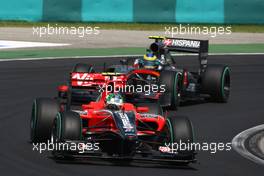 01.08.2010 Budapest, Hungary,  Lucas di Grassi (BRA), Virgin Racing leads Bruno Senna (BRA), Hispania Racing F1 Team, HRT - Formula 1 World Championship, Rd 12, Hungarian Grand Prix, Sunday Race
