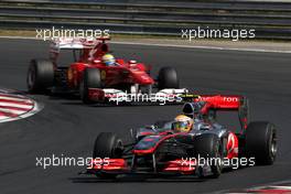 01.08.2010 Budapest, Hungary,  Lewis Hamilton (GBR), McLaren Mercedes, MP4-25 leads Felipe Massa (BRA), Scuderia Ferrari, F10 - Formula 1 World Championship, Rd 12, Hungarian Grand Prix, Sunday Race