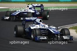 01.08.2010 Budapest, Hungary,  Rubens Barrichello (BRA), Williams F1 Team leads Nico Hulkenberg (GER), Williams F1 Team - Formula 1 World Championship, Rd 12, Hungarian Grand Prix, Sunday Race