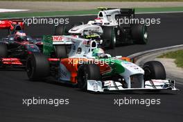01.08.2010 Budapest, Hungary,  Vitantonio Liuzzi (ITA), Force India F1 Team leads Jenson Button (GBR), McLaren Mercedes - Formula 1 World Championship, Rd 12, Hungarian Grand Prix, Sunday Race