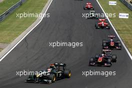 01.08.2010 Budapest, Hungary,  Jarno Trulli (ITA), Lotus F1 Team, T127 leads Sébastien Buemi (SUI), Scuderia Toro Rosso - Formula 1 World Championship, Rd 12, Hungarian Grand Prix, Sunday Race