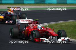 01.08.2010 Budapest, Hungary,  Fernando Alonso (ESP), Scuderia Ferrari leads Mark Webber (AUS), Red Bull Racing - Formula 1 World Championship, Rd 12, Hungarian Grand Prix, Sunday Race