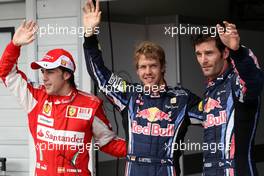 31.07.2010 Budapest, Hungary,  Vettel (GER), Red Bull Racing gets pole position, Fernando Alonso (ESP), Scuderia Ferrari with Mark Webber (AUS), Red Bull Racing - Formula 1 World Championship, Rd 12, Hungarian Grand Prix, Saturday Qualifying