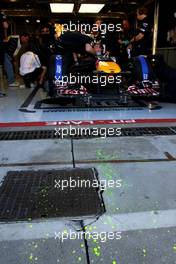 10.09.2010 Monza, Italy,  Sebastian Vettel (GER), Red Bull Racing leave aero paint on the floor outside the garage - Formula 1 World Championship, Rd 14, Italian Grand Prix, Friday Practice