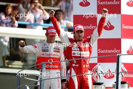 12.09.2010 Monza, Italy,  Fernando Alonso (ESP), Scuderia Ferrari and Jenson Button (GBR), McLaren Mercedes  - Formula 1 World Championship, Rd 14, Italian Grand Prix, Sunday Podium